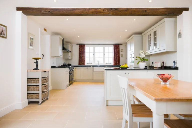 bright kitchen with white cabinets