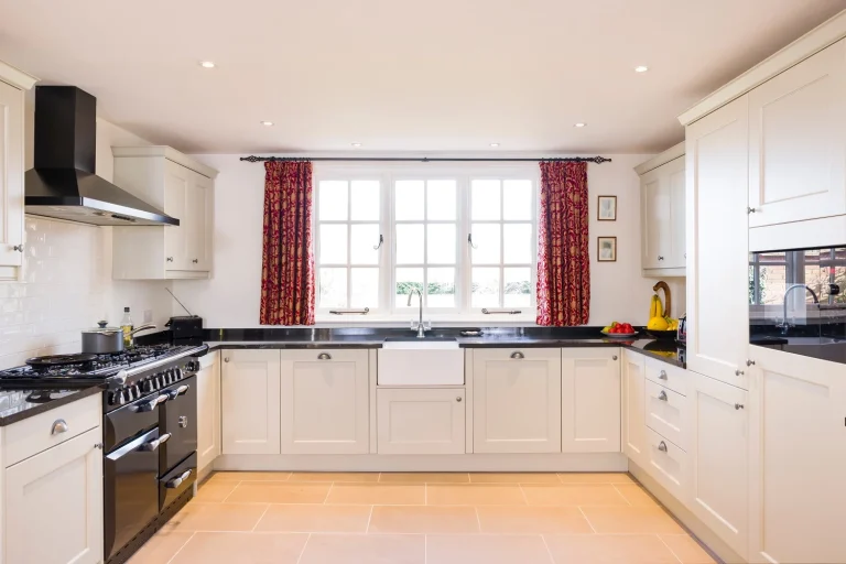 bright kitchen with white cabinets